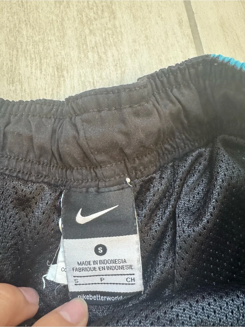 Nike Black Athletic Shorts with Neon Green Drawstring and Teal Accents